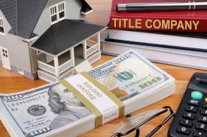 Home buyer reviewing title insurance and closing documents in Texarkana