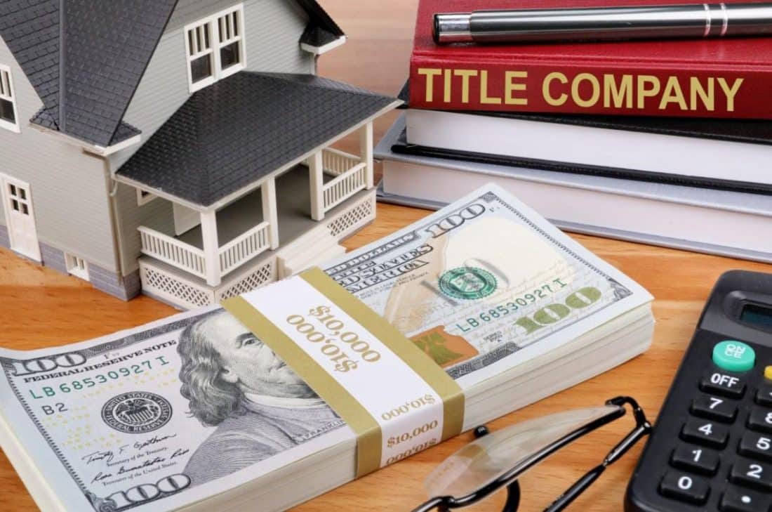 Home buyer reviewing title insurance and closing documents in Texarkana